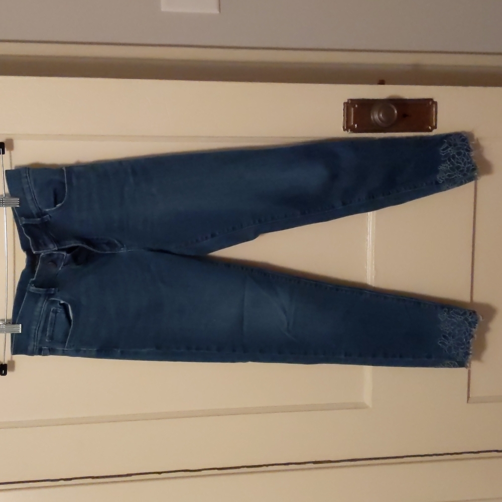 Ann Taylor medium wash jeans with floral embroidered cuffs, size 8